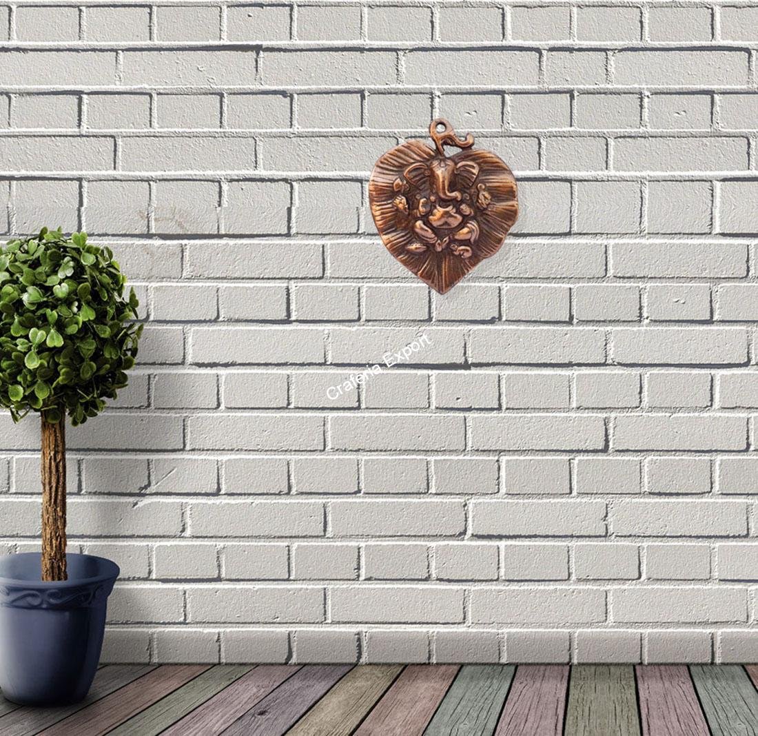 Handcrafted Metal Ganesha on palm leaf wall hanging showpiece/ gift idols