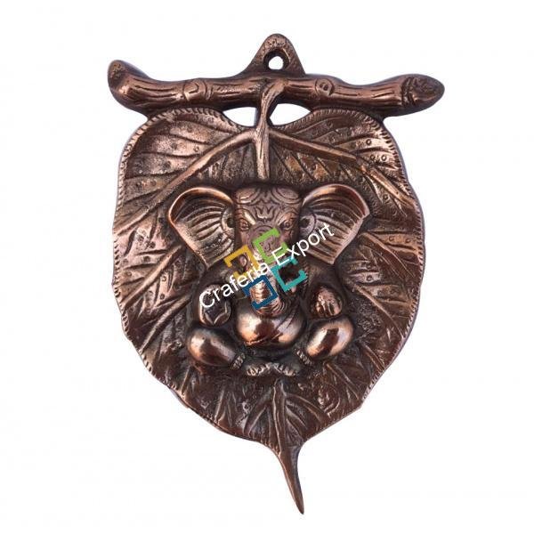 Metal Ganesha wall hanging on leaf showpiece/idols for gift/decor