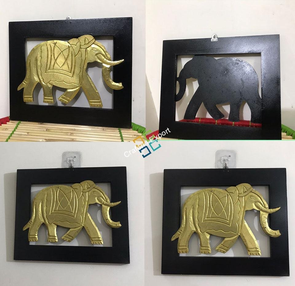 wooden frame of brass elephant for wall decor